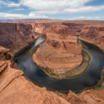 The breathtaking view of Horseshoe Bend is a stunning natural wonder perfect for a memorable visit to Las Vegas. Roland Bast